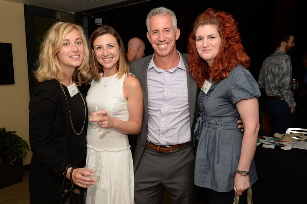 Steve Schneider of Office Works enjoys the evening with Chloe Bouscaren and Beth Wilson-Shunta of NBBJ and Jessica Burdin of Lee Kennedy Company.
